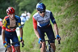 Israel - Premier Tech's Canadian rider Michael Woods (R) and Lidl - Trek's Italian rider Giulio Ciccone (L) cycle in a breakaway during the 14th stage of the 110th edition of the Tour de France cycling race, 152 km between Annemasse and Morzine Les Portes du Soleil, in the French Alps, on July 15, 2023. (Photo by Marco BERTORELLO / AFP)