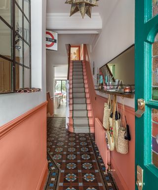 peach hallway with victorian floor tiles