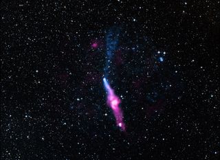 The pulsar, PSR J1509-5850, located about 12,000 light years from Earth and appearing as the bright white spot in the center of this image, has generated a long tail of X-ray emission trailing behind it, as seen in the lower part of the image.