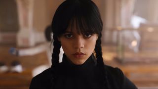 Wednesday Adams (Jenna Ortega) stares menacingly in Wednesday