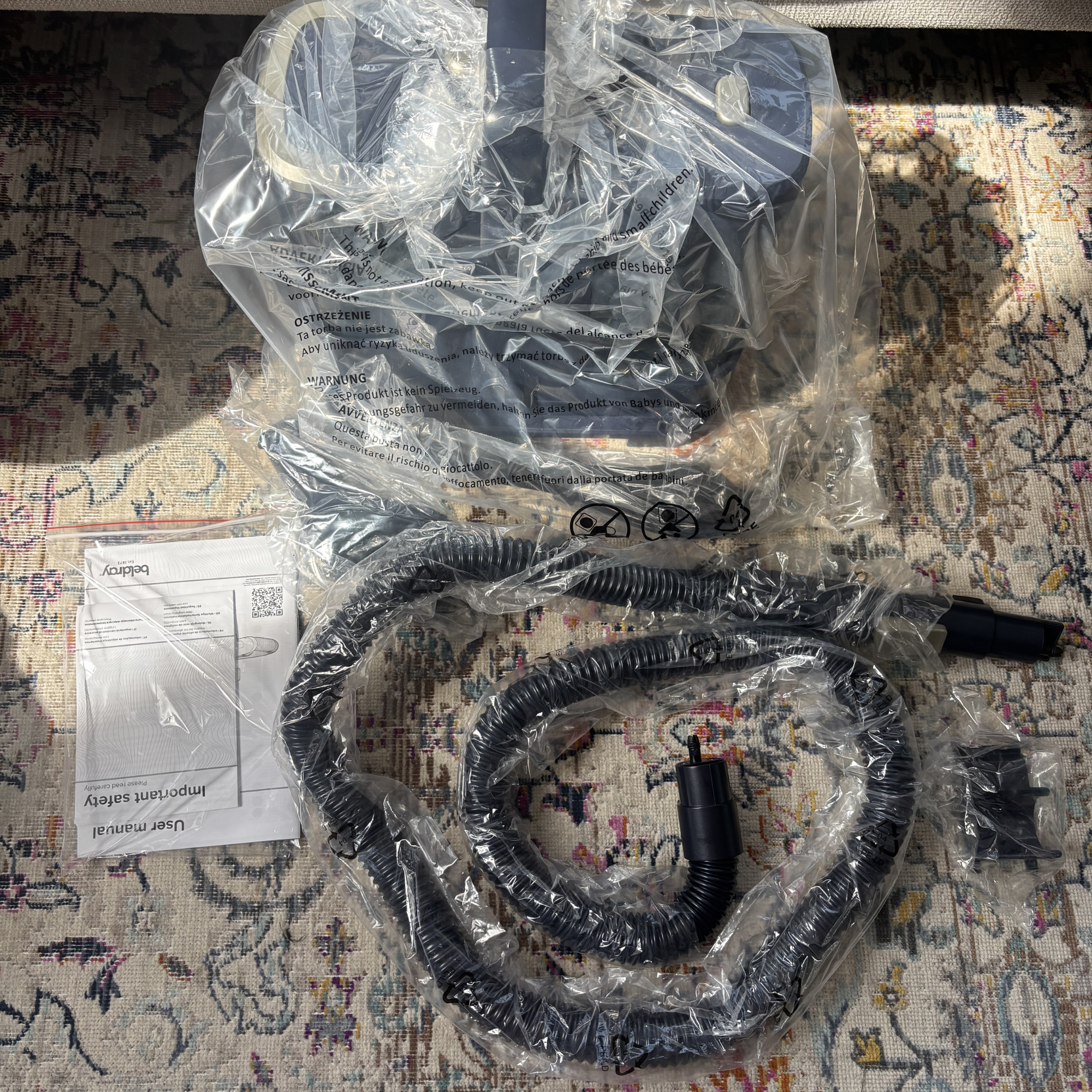 Beldray Spot Lift Pro Carpet Cleaner parts and accessories in plastic packaging