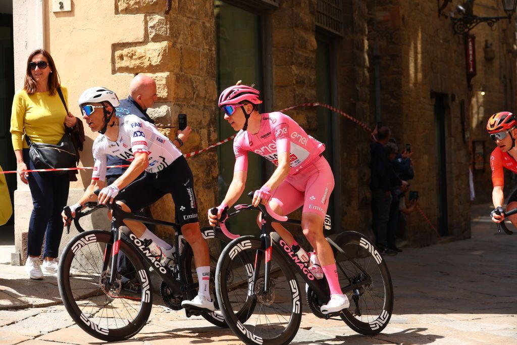 Pink Jersey, Team UAE's Slovenian rider Tadej Pogacar is pictured in Volterra during the 6th stage of the 107th Giro d'Italia cycling race, 180 km between Torre del lago Puccini and Rapolano Terme, on May 9, 2024. (Photo by Luca Bettini / AFP)