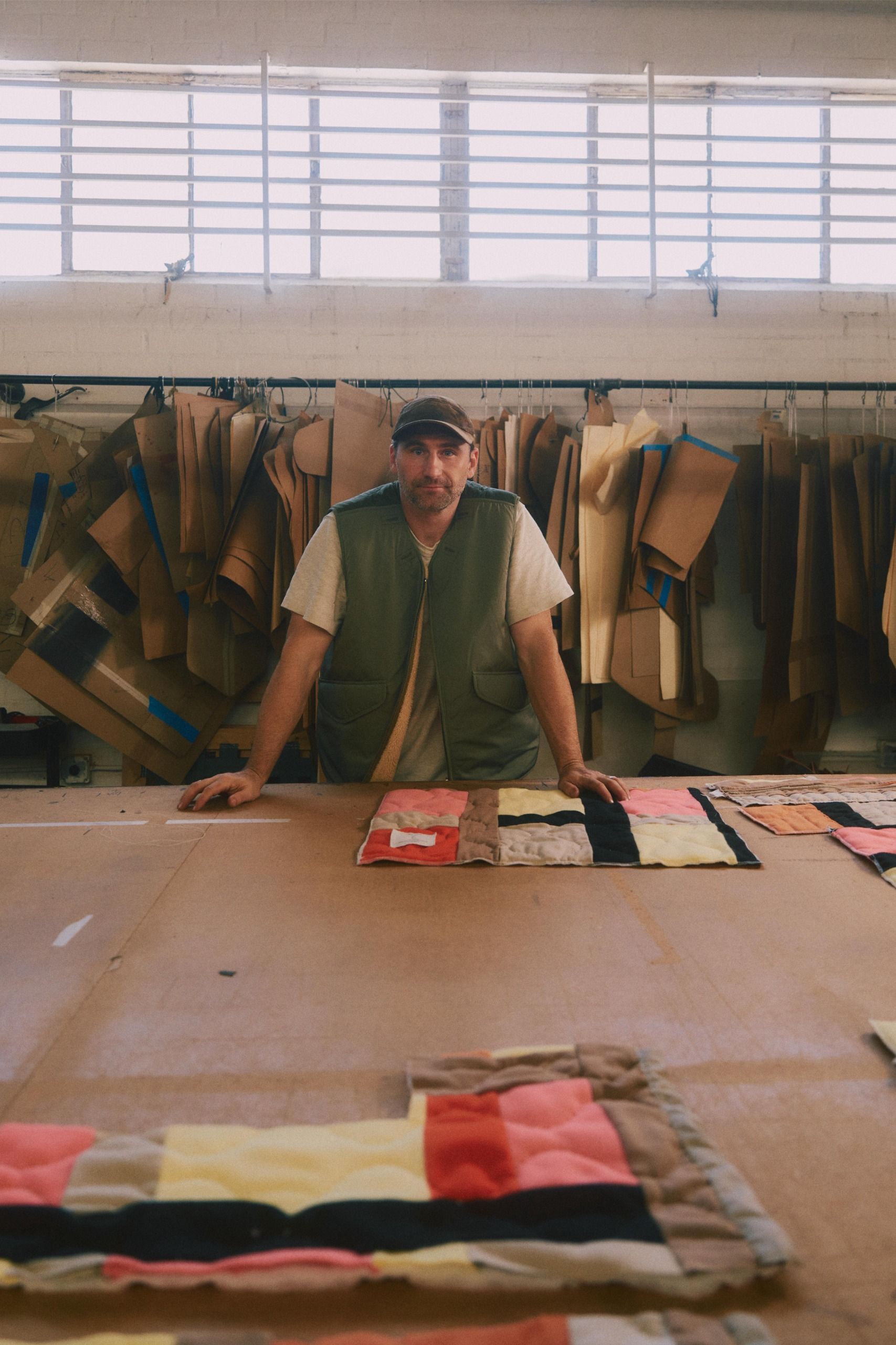 Stephen Kenn with upholstery samples in his workshop