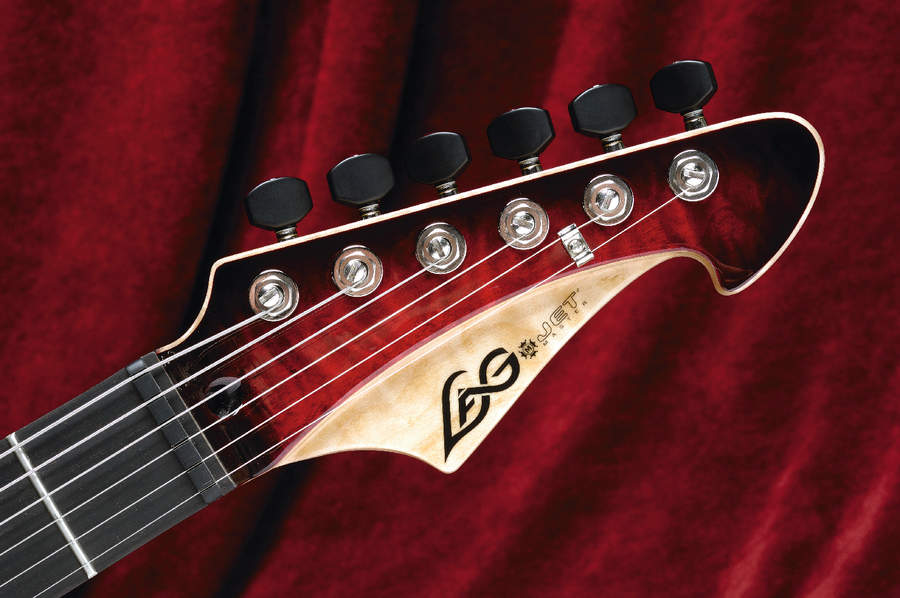 The two-tone stepped headstock is a stylish addition to the Jet.