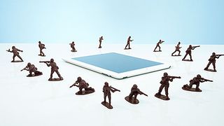 Toy soldiers surrounding the iPad