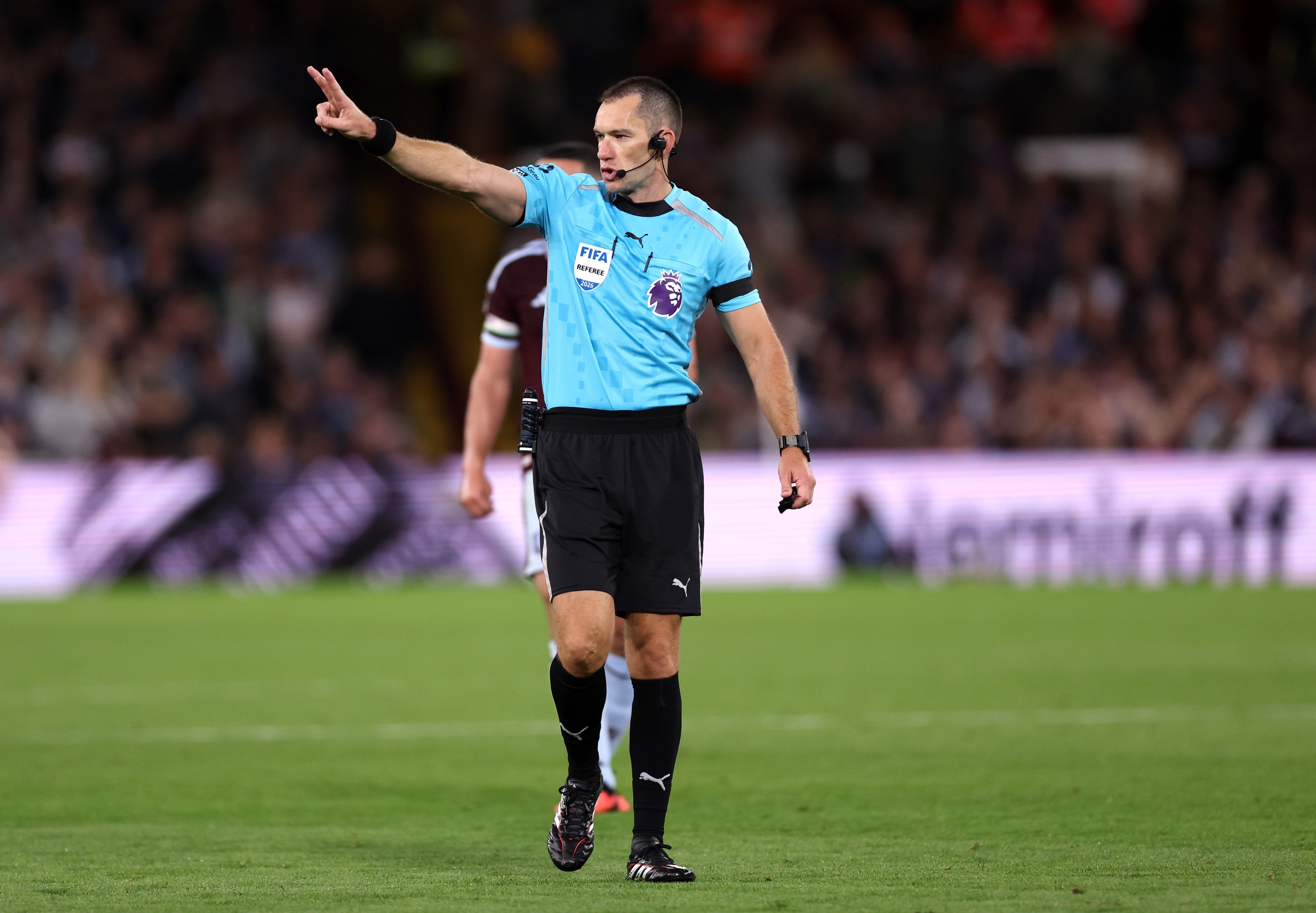 Referee Jarred Gillett counts down
