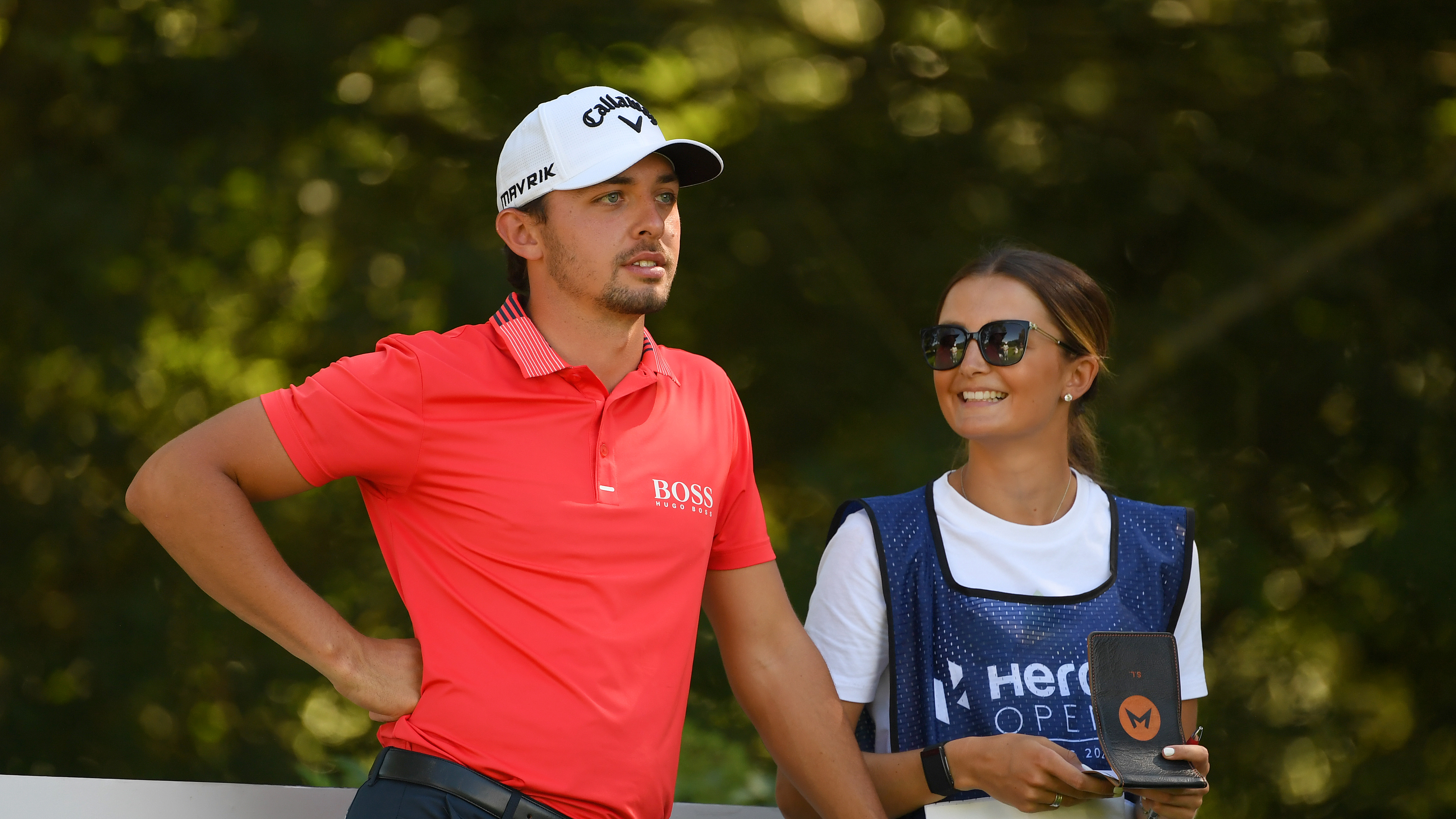 Marco Penge and his wife, Sophie stand on a tee box at the 2020 Hero Open