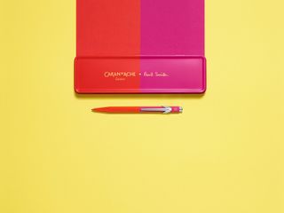 Paul Smith Caran d'Ache pen and case in red and pink