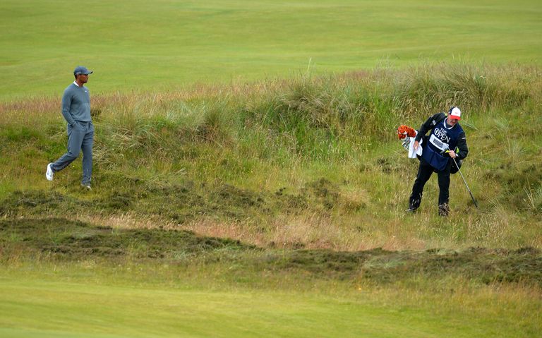 Tiger Woods and caddie Joe LaCava trying to locate his ball in the rough on the 5th hole of the Old Course at St Andrews during The Open Championship of 2015. What is the rough in golf article.