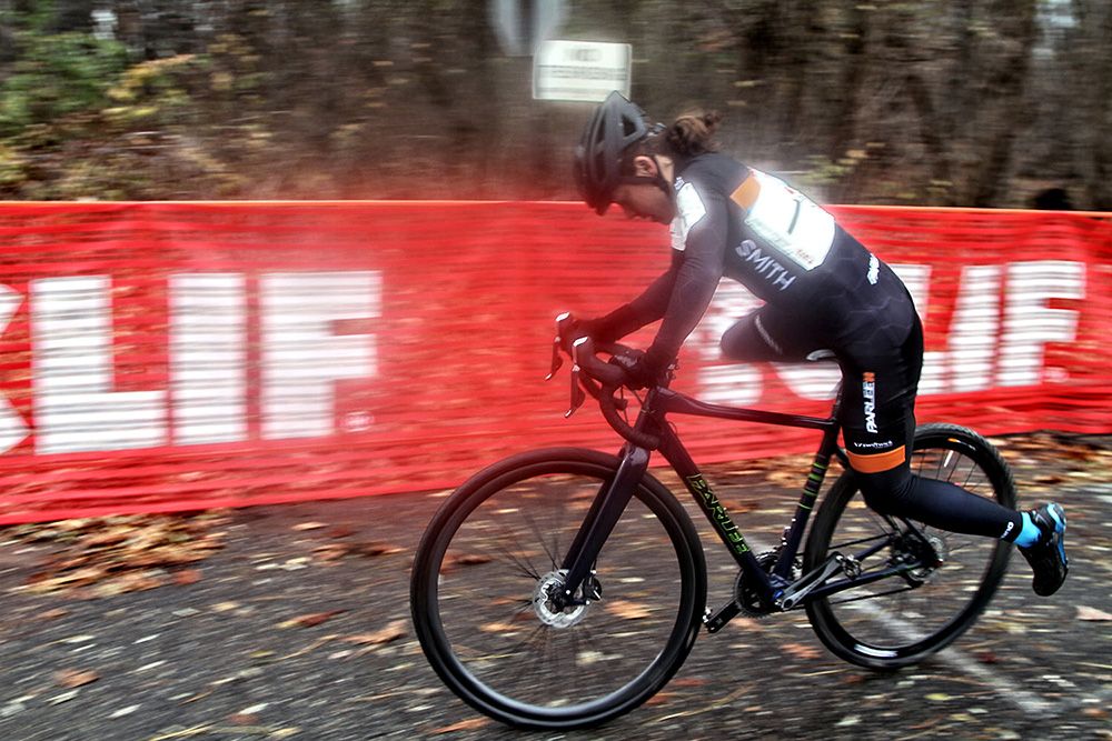 Crystal Anthony (maxxis-shimano pro cyclocross) mounts her bike after losing precious seconds at today&rsquo;s Women&rsquo;s Field start