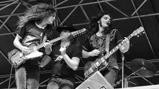 Allen Collins, Ronnie Van Zant and Gary Rossington of Lynyrd Skynyrd perform live at The Oakland Coliseum in 1976 in Oakland, California.