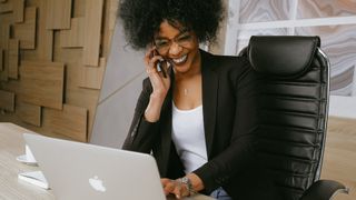 woman on a phone call in the office