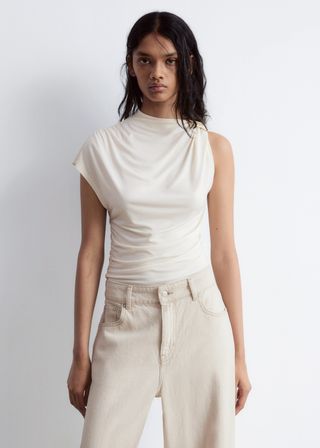 eAKr9DUWPg7UPeyHmwr67S-320-80 سراويل الساتان في Uniqlo تسير فيروسية - 3 طرق سهلة لتصميمها