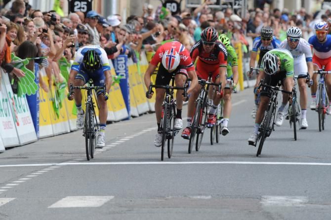 Norwegian champion Edvald Boasson Hagen (Sky) takes a close victory ahead of Michael Matthews (Orica-GreenEdge)
