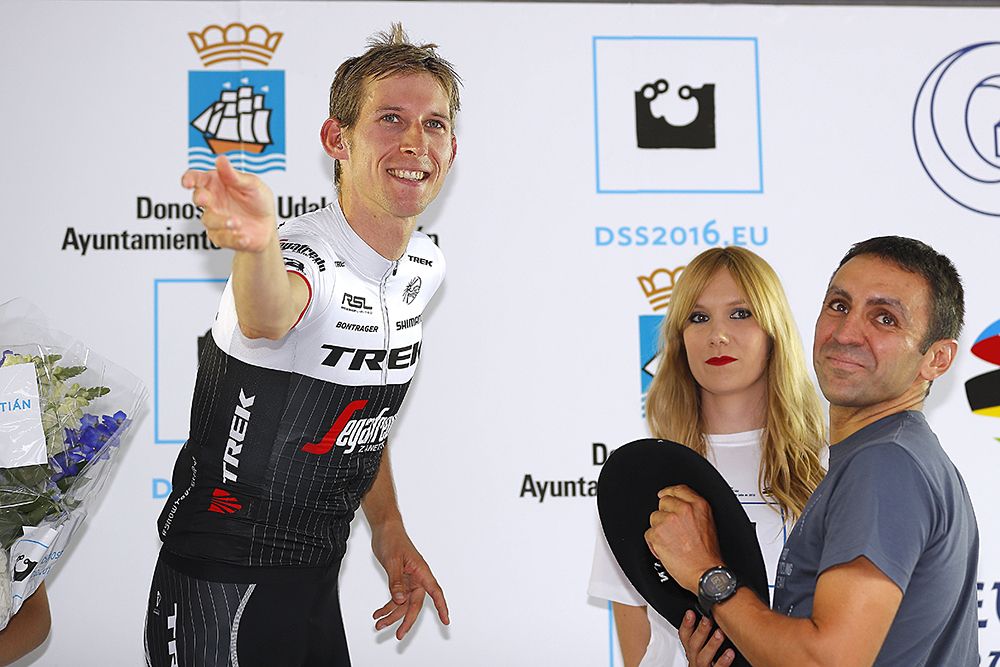 Bauke Mollema (Trek-Segafredo) throws his Trek-Segafredo hat to the crowd