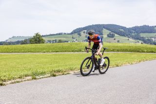 Male cyclist riding an electric bike
