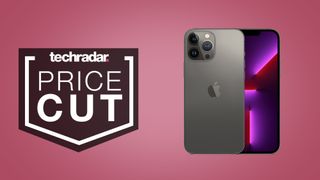 iPhone 13 Pro Max in black on light pink background, beside text that reads 'price cut'