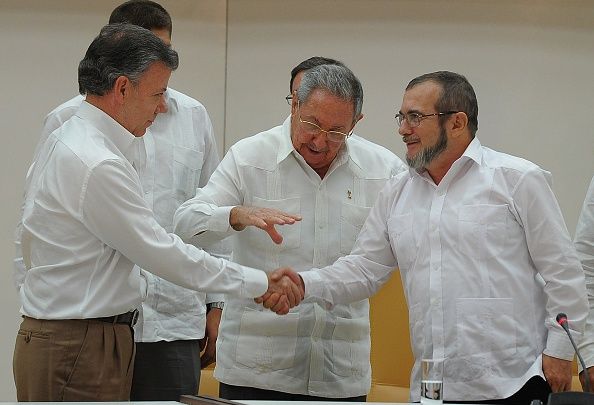 Colombian President Juan Manuel Santos, left, and FARC leader Rodrigo Londono.