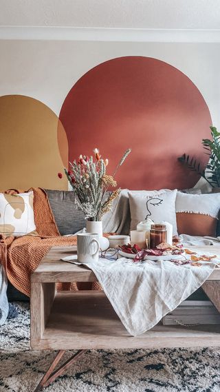living room with two color block circles in deep orange and mustard