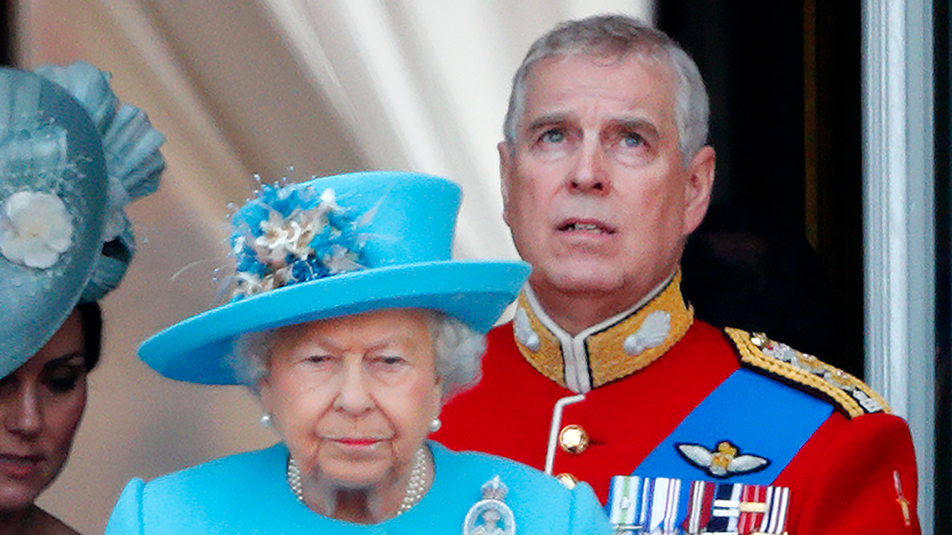 Queen Elizabeth II and Prince Andrew, Duke of York watch a flypast from the balcony of Buckingham Palace during Trooping The Colour, the Queen's annual birthday parade on June 9, 2018 in London, England