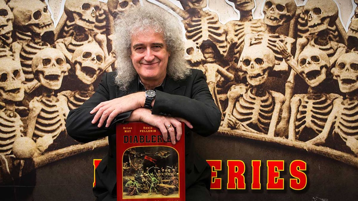 Brian May with Diableries book