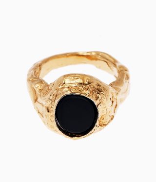 Gold textured ring set with black stone