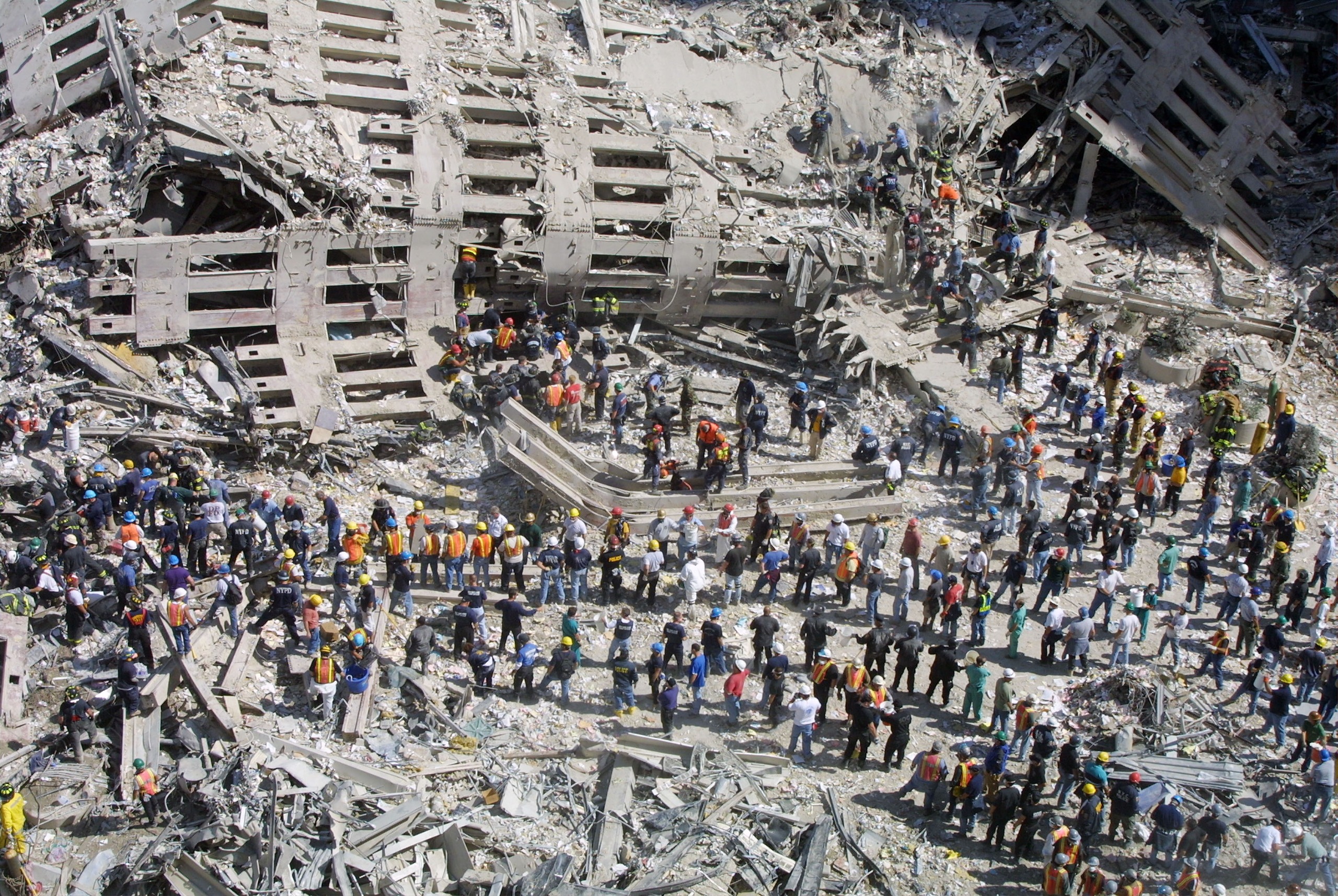 Rescue workers sift through the wreckage of the World Trade Center September 13, 2001 in New York City, two days after two hijacked airplanes slammed into the twin towers, leveling them in an alleged terrorist attack.