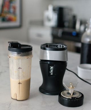 Making a smoothie in a ninja fit personal blender