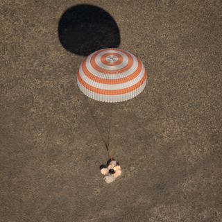 The Russian Soyuz capsule carrying the International Space Station's Expedition 50 crew lands safely in the steppes of Kazakhstan on April 10, 2017. The capsule returned NASA astronaut Shane Kimbrough and Russian cosmonauts Sergey Ryzhikov and Andrey Borisenko to Earth after 173 days in space.