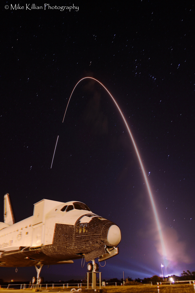 space shuttle blast off at night