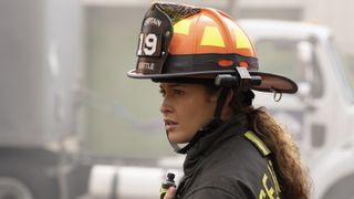 Jaina Lee Ortiz as Andy in ia firefighter hat in Station 19 season 7