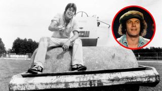 Stephen King sits atop a steamroller 