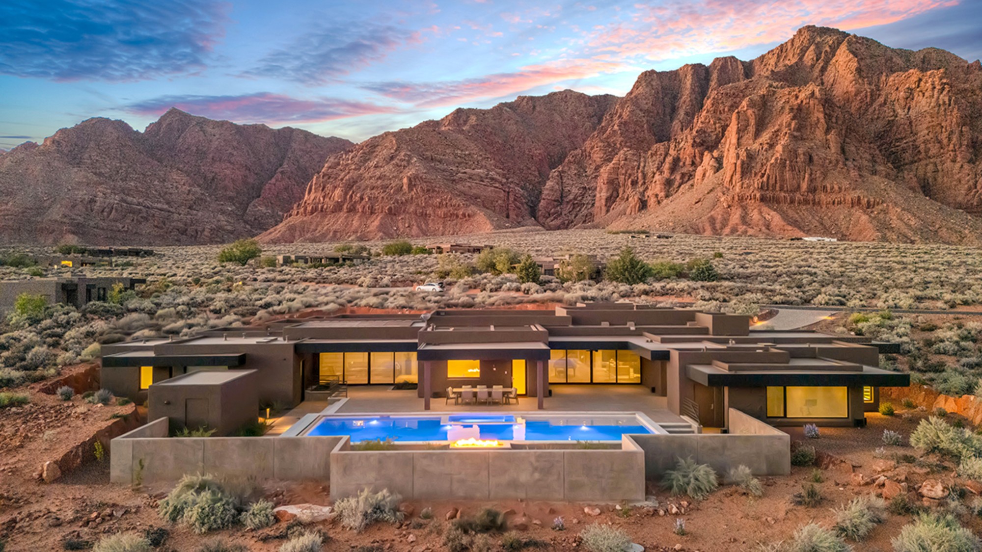 Home surrounded by red rocks in Utah