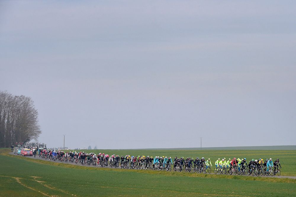 The peloton rolls through the French countryside.