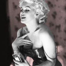 Marilyn Monroe Putting Chanel Perfume On