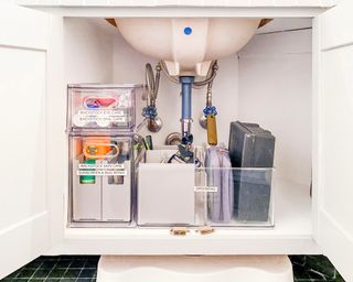 organized under sink storage