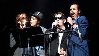 A photo of Nick Cave, Shane MacGowan, Jarvis Cocker and Pete Doherty on stage at Meltdown Festival in 2007