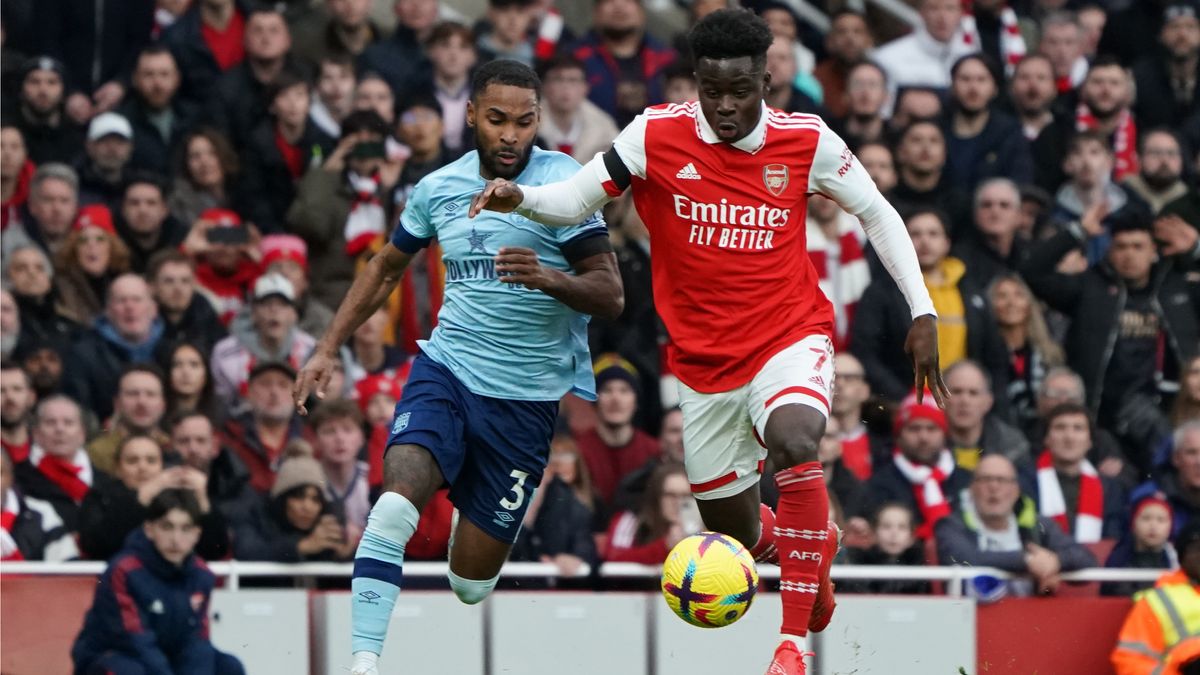 Arsenal&#039;s Bukayo Saka battles with Brentford&#039;s Rico Henry during the Premier League match on Feb. 11, 2023