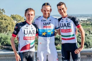 Dan Martin, Alexander Kristoff and Fabio Aru show off their new UAE Team Emirates jersey