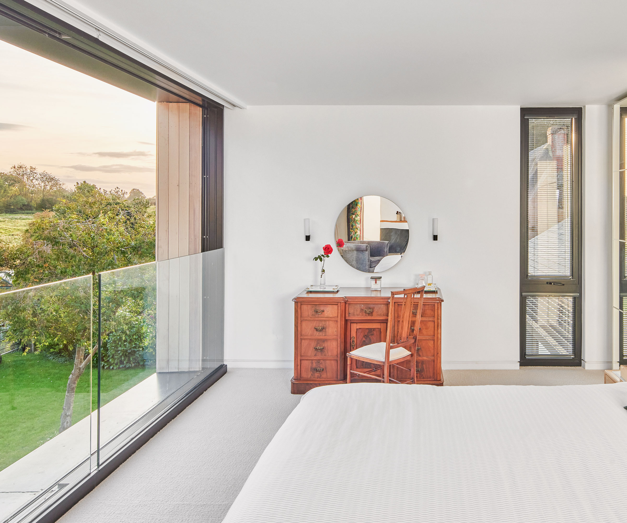 bedroom with sliding doors and Juliette balcony