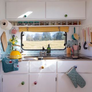 Caravan makeover with kitchen area and window