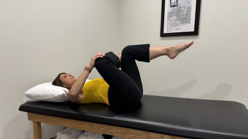 woman doing hip flexor stretches