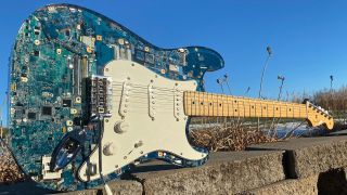 AWDCUTLASS built a guitar out of old laptop parts
