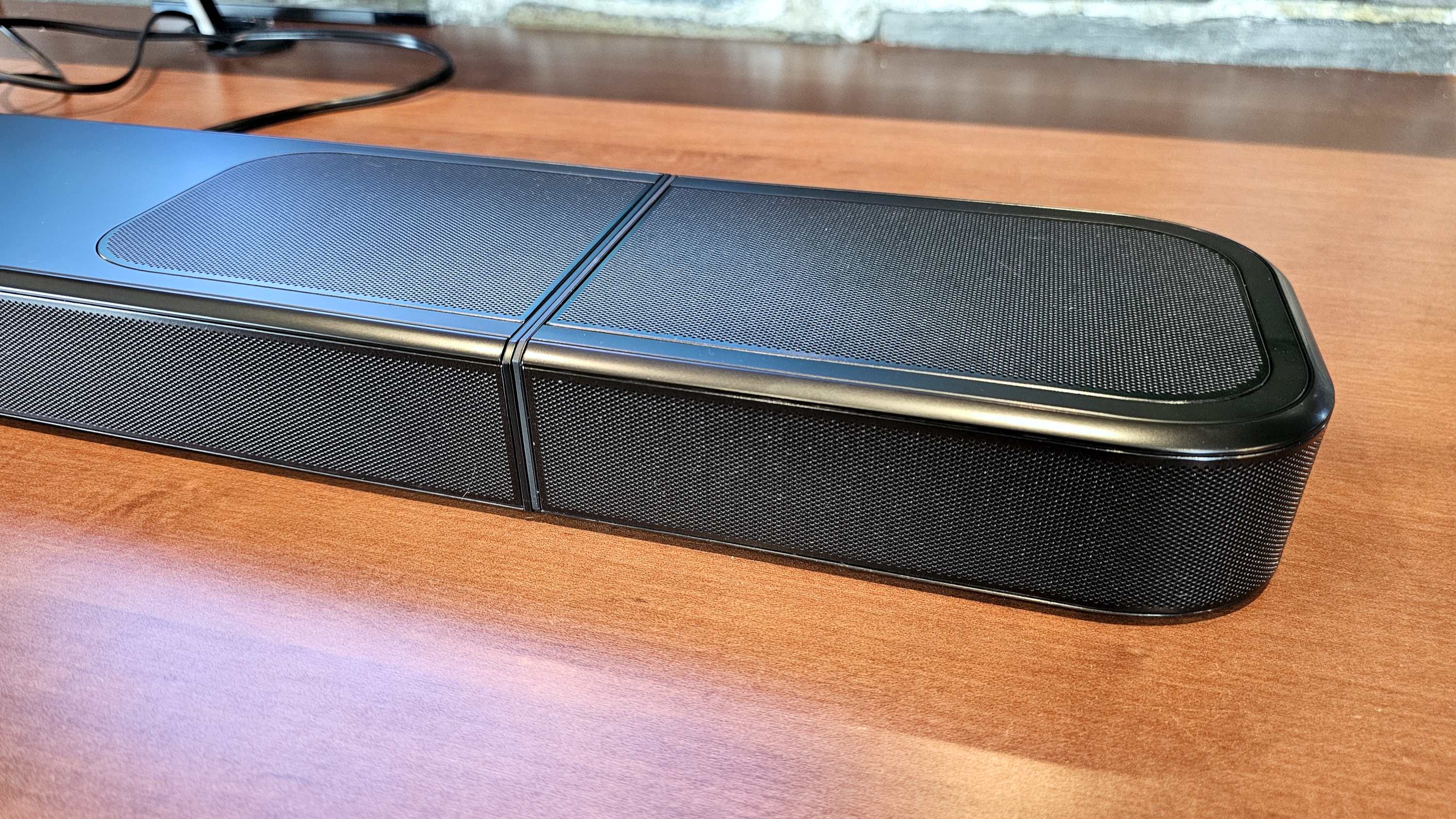 JBL Bar 1000MK2 gallery showing ports and surround speaker docking and power options