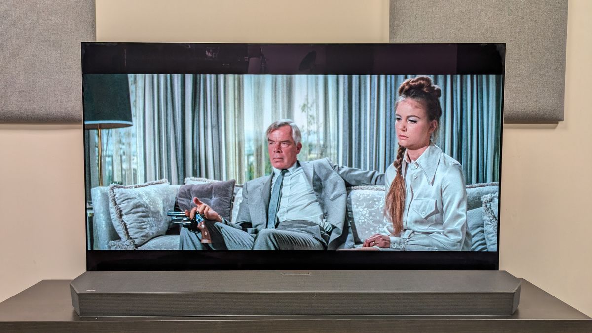 Point Blank 4K Blu-ray showing Walker and Lynne sat on a sofa, shown on LG G5 OLED