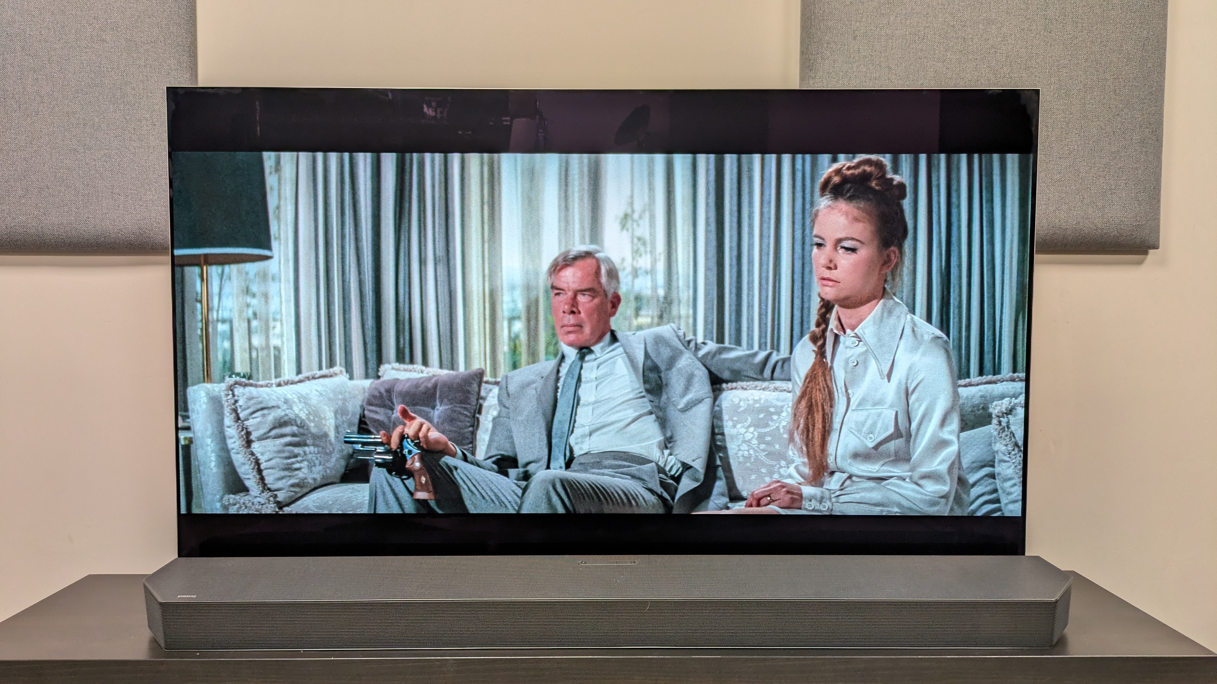 Point Blank 4K Blu-ray showing Walker and Lynne sat on a sofa, shown on LG G5 OLED