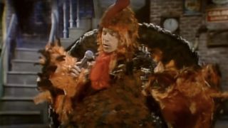 Paul Simon singing in a turkey outfit on SNL