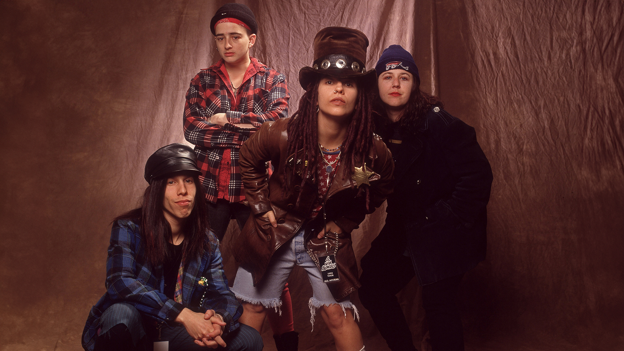 Studio portrait of American Rock group Four Non Blondes, Chicago, Illinois, March 3, 1993. Pictured are, from left, Roger Rocha, Christa Hillhouse, Linda Perry, and Dawn Richardson.