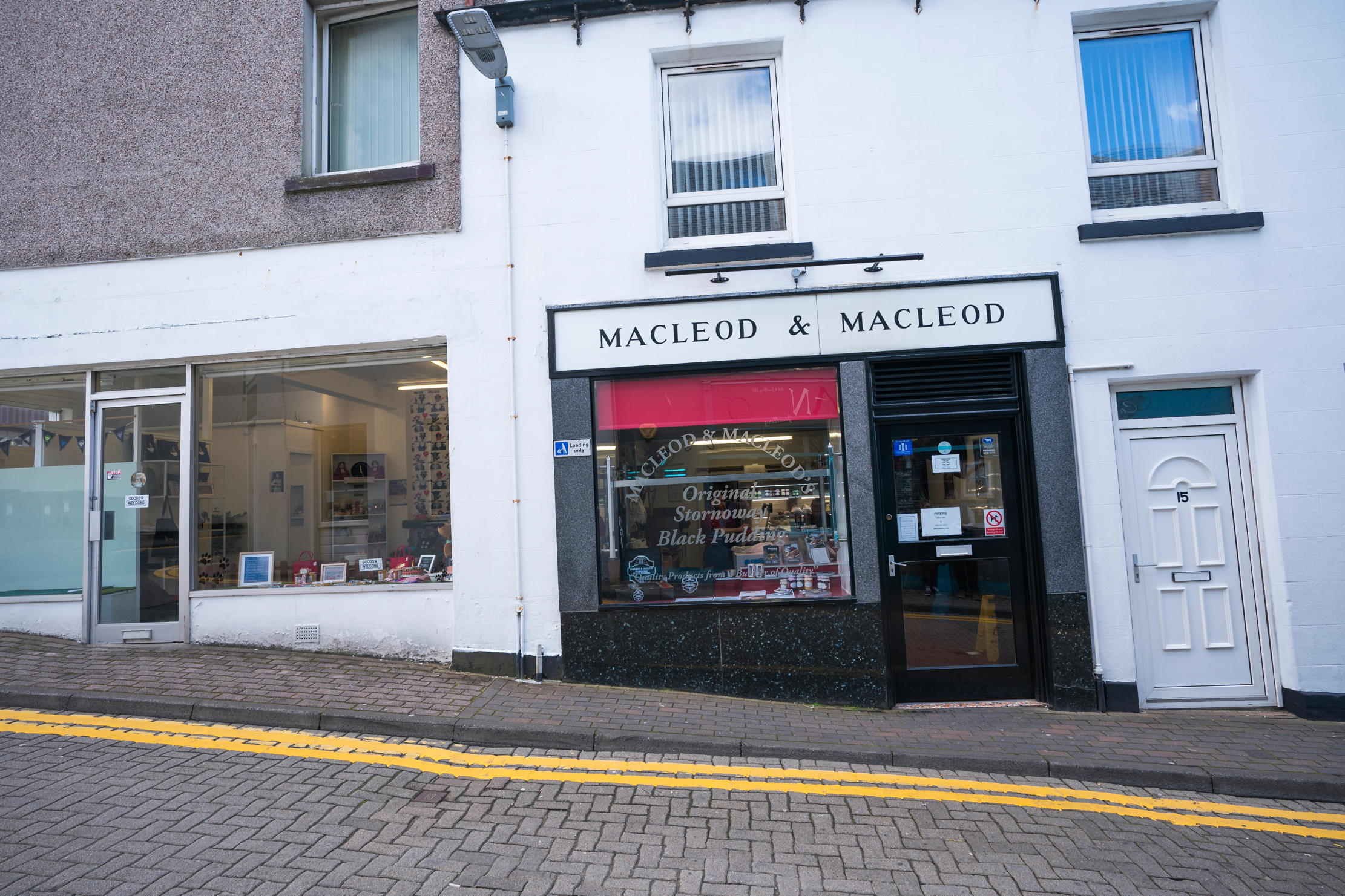 Exterior of the Macleod &amp;amp; Macleod butcher where the island&#039;s prized Blood pudding, or black pudding, is sold, Stornoway, Isle of Lewis, Scotland, UK,