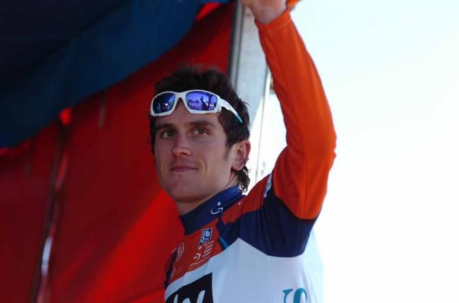 Geraint Thomas (Sky) holds the ochre jersey.